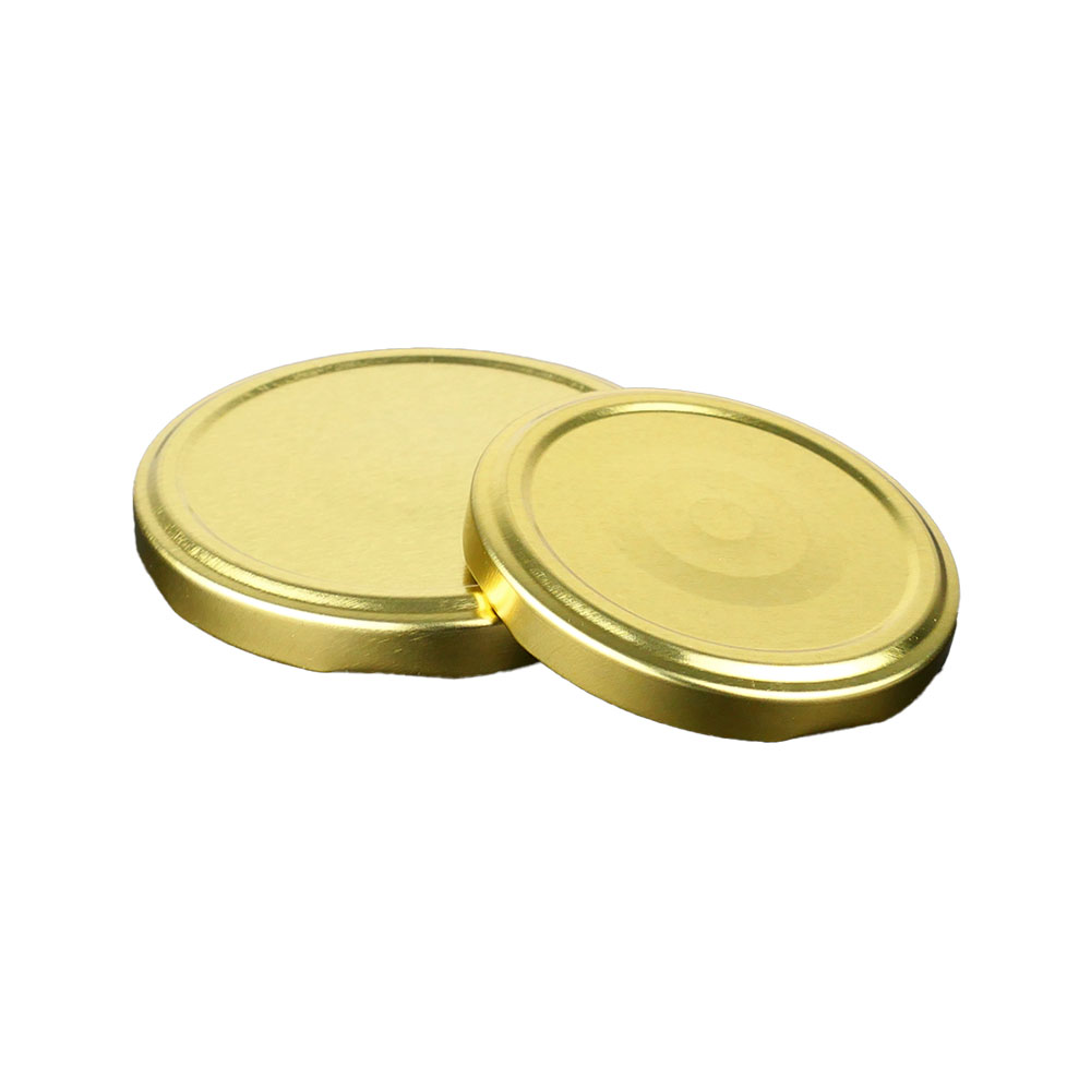 Weithalsdeckel TO66 gold, für ölhaltige Produkte geeignet, mit Button Weithalsdeckel TO66 gold, für ölhaltige Produkte geeignet, mit Button
